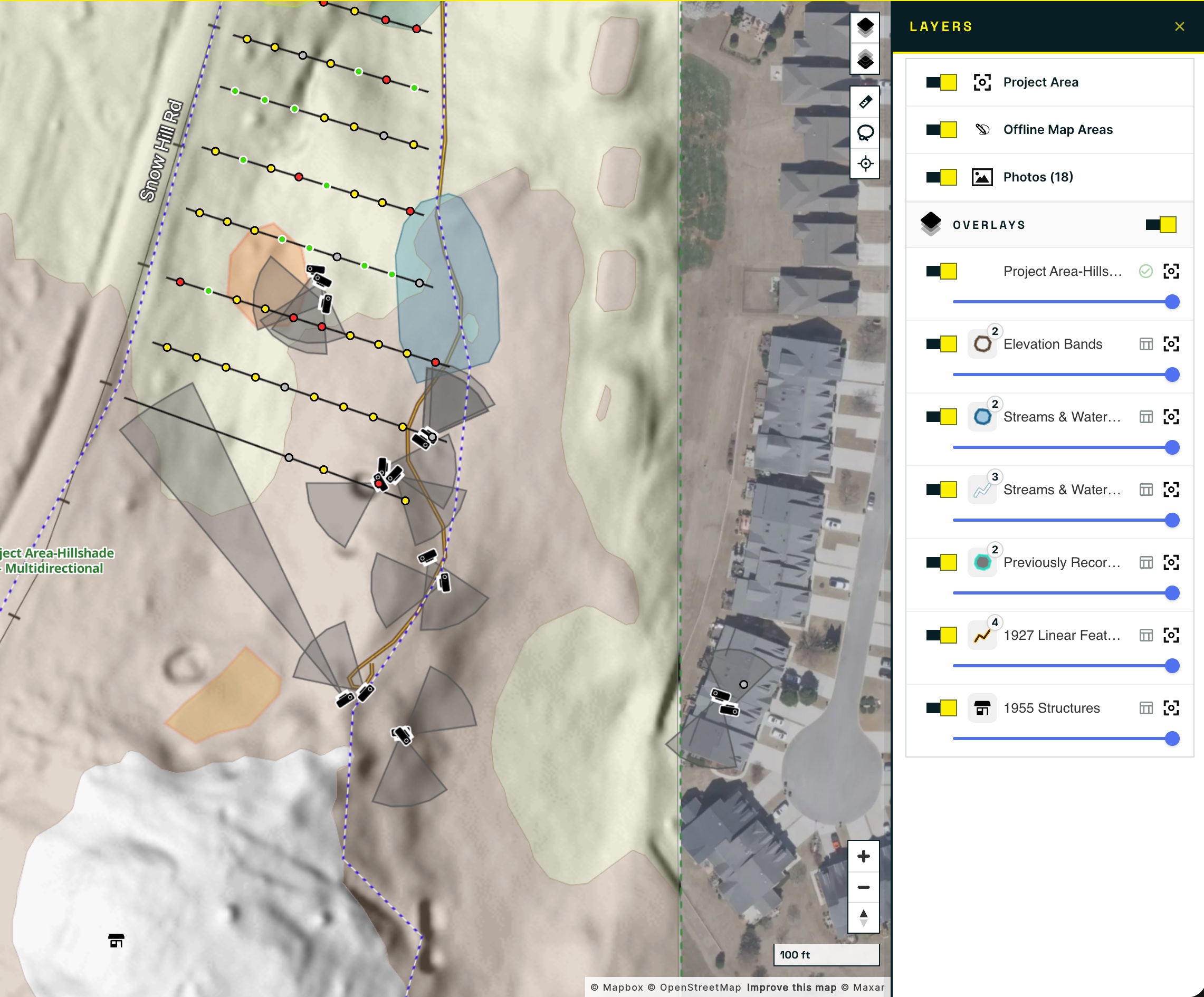 The Layers panel open beside the map, listing Project Area, Offline Map Areas, and Photos above an Overlays group containing vector and raster layers, each with a toggle, feature count, and opacity slider