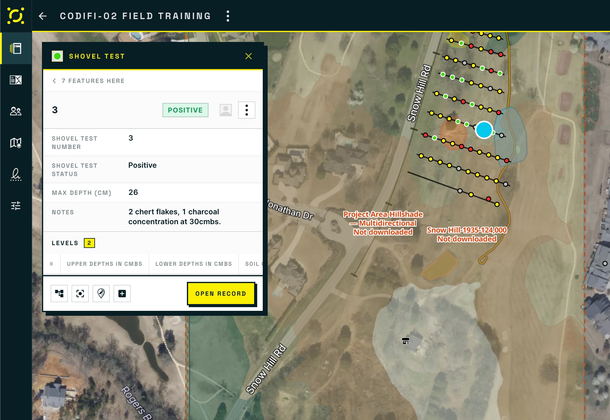 A Shovel Test info card showing the Record number, a Positive status chip, its Fields, a Levels repeater count, and an Open Record button, with the selected Record highlighted on the map