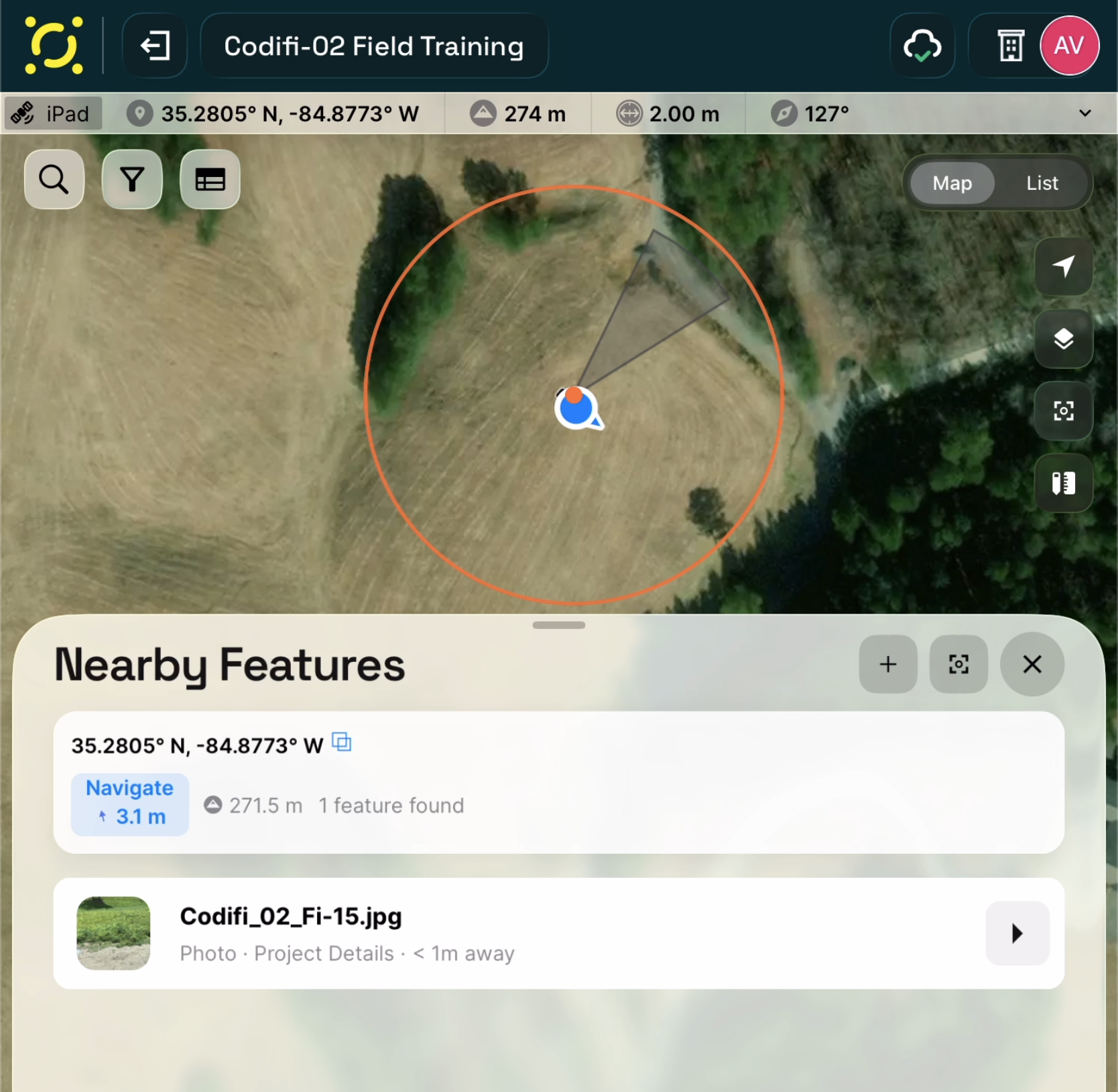 The Nearby Features panel after a long-press, showing the query radius and a photo in the results list